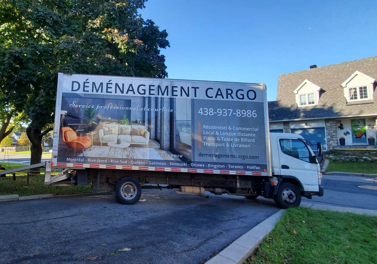 Moving in Oka - Professional movers loading a truck